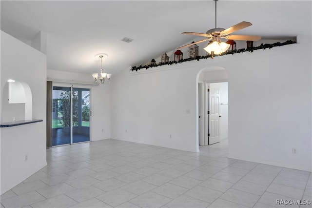 spare room featuring light tile patterned floors, ceiling fan with notable chandelier, and vaulted ceiling