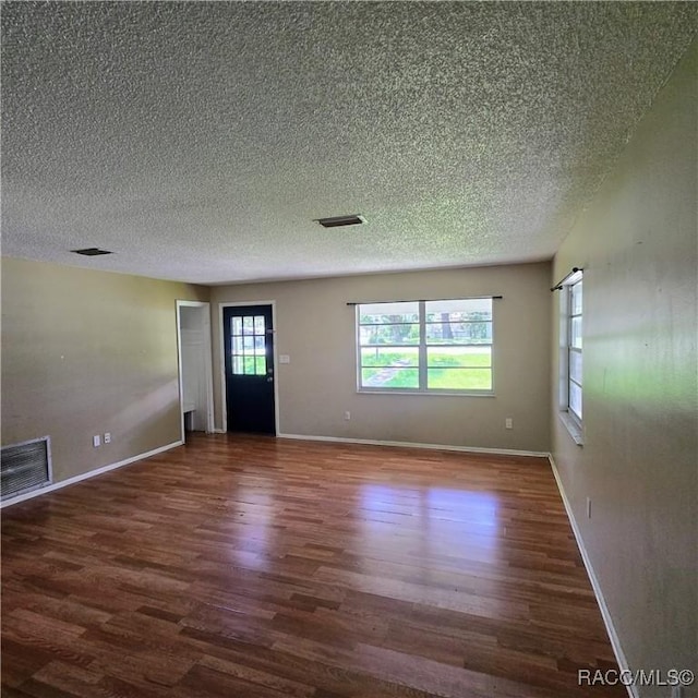 9227 N Fawn Way, Citrus Springs, FL 34434 - foyer featuring wood finished floors and a textured ceiling