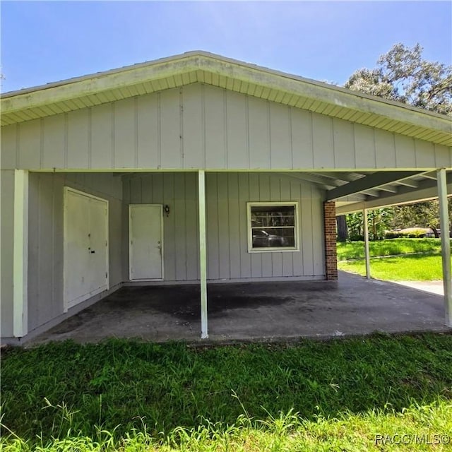 9227 N Fawn Way, Citrus Springs, FL 34434 - view of side of home with a patio area