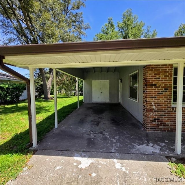 9227 N Fawn Way, Citrus Springs, FL 34434 - view of parking featuring an attached carport