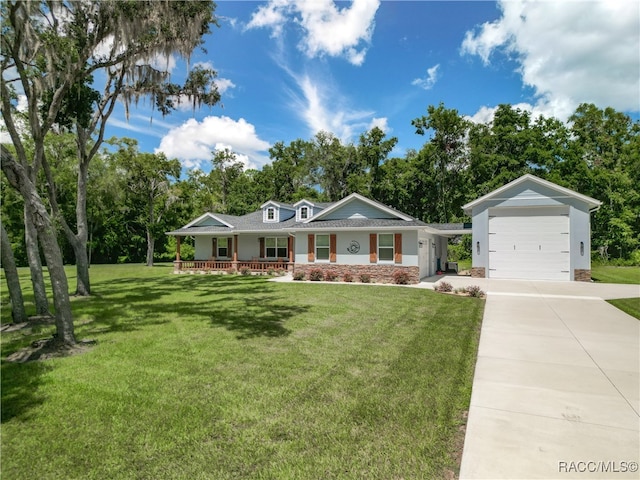 ranch-style home featuring a porch, a garage, and a front yard