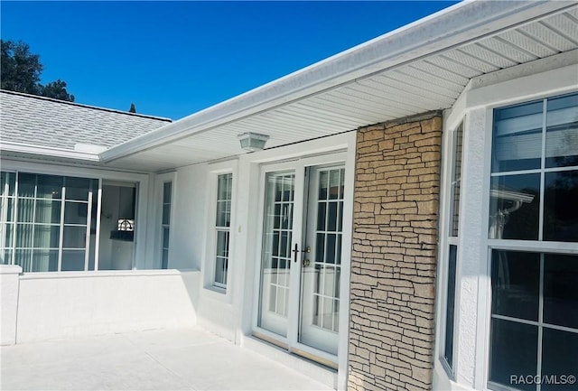 entrance to property featuring french doors