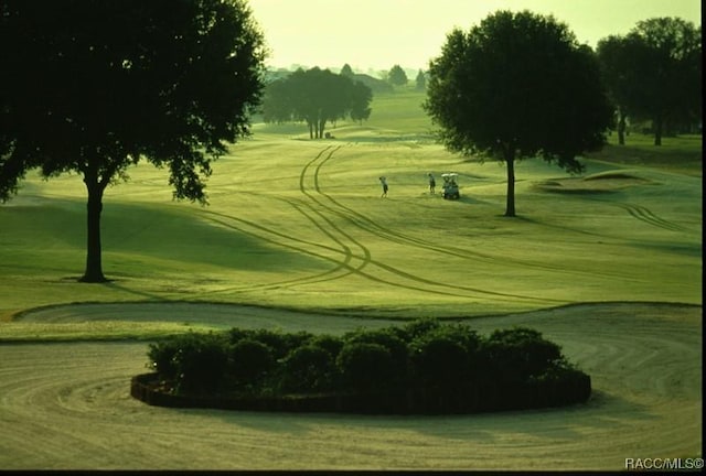 view of home's community featuring golf course view