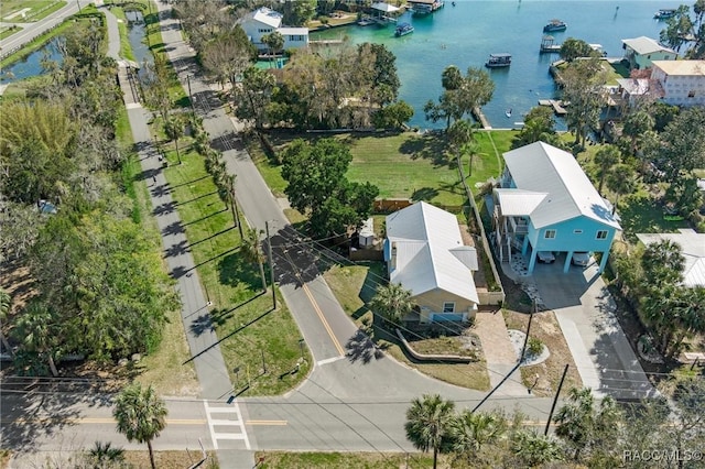 birds eye view of property featuring a water view