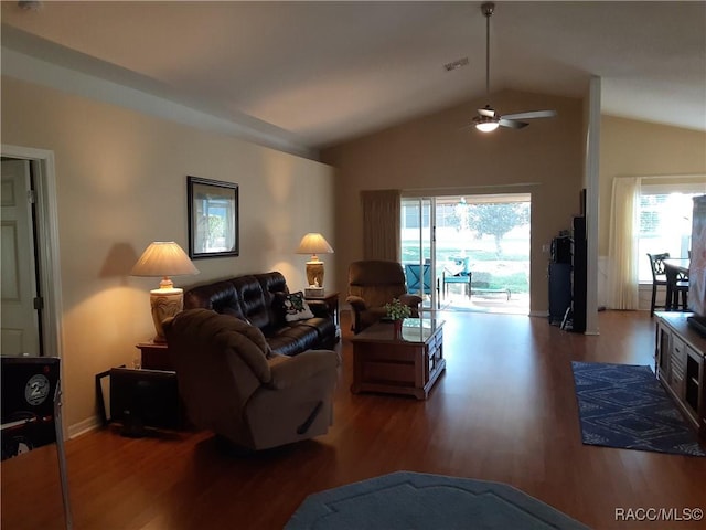 living room with hardwood / wood-style floors, ceiling fan, and lofted ceiling