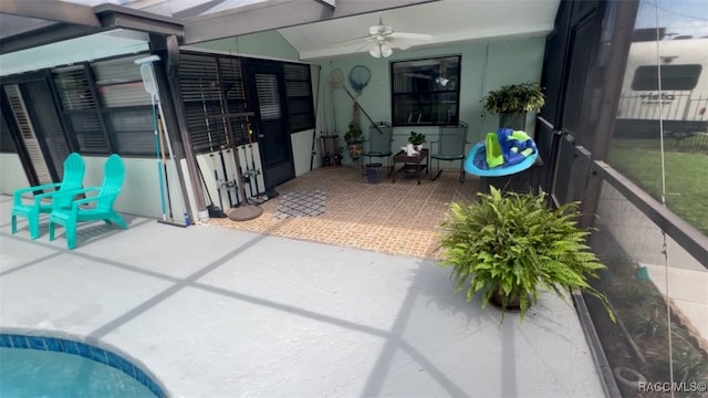 view of patio featuring ceiling fan