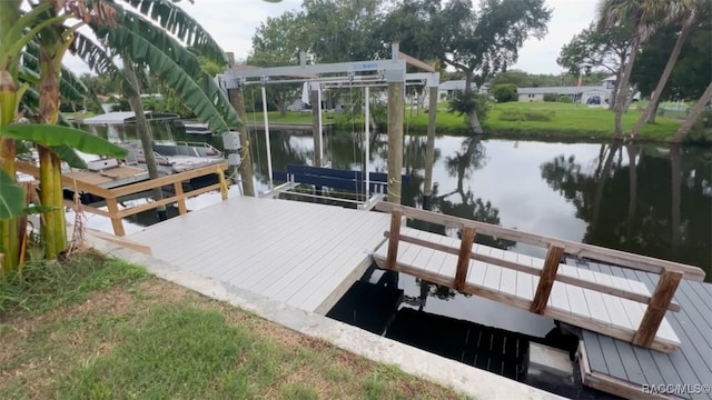 view of dock with a water view