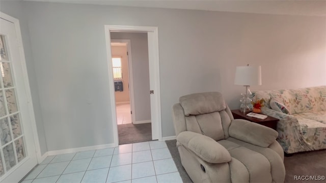 living room featuring light tile patterned flooring