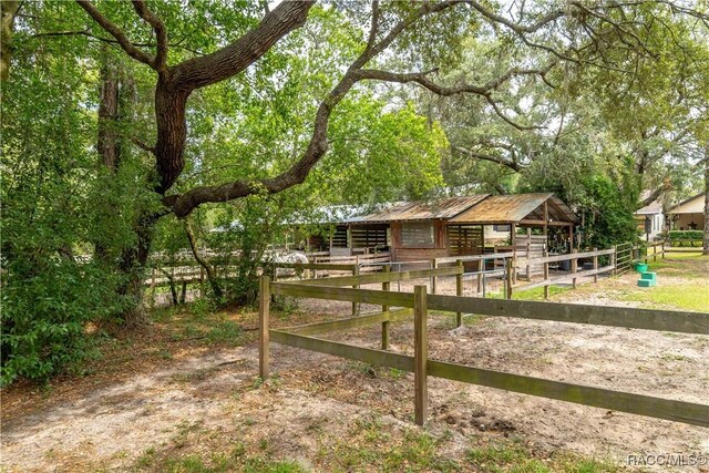 4200 W Breckenridge Ct, Beverly Hills, FL 34465 - view of yard with an exterior structure and an outdoor structure