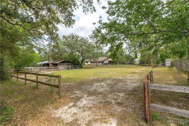 4200 W Breckenridge Ct, Beverly Hills, FL 34465 - view of yard featuring an exterior structure, an outdoor structure, and a view of countryside
