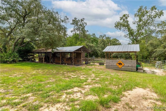 4200 W Breckenridge Ct, Beverly Hills, FL 34465 - view of yard with an exterior structure and an outdoor structure