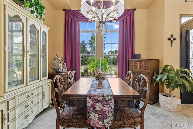 5061 W Oakhill St, Dunnellon, FL 34433 - dining area featuring a chandelier