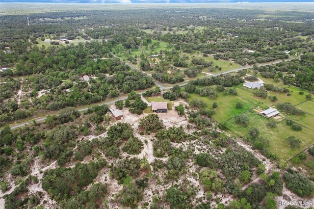 5061 W Oakhill St, Dunnellon, FL 34433 - aerial view of property and surrounding area featuring a heavily wooded area