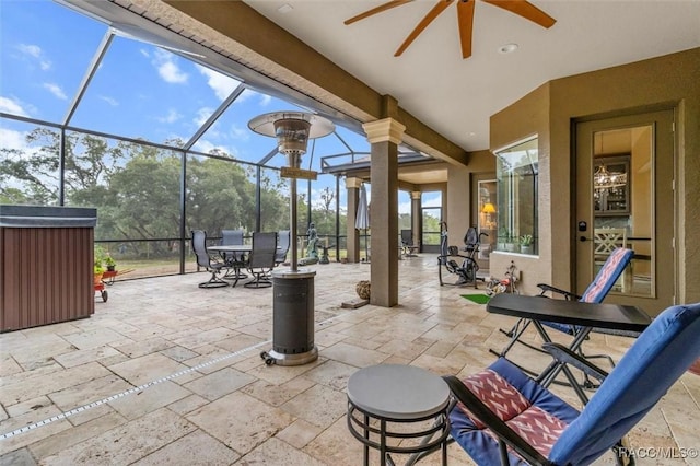 5061 W Oakhill St, Dunnellon, FL 34433 - view of patio featuring a ceiling fan, a lanai, and outdoor dining space