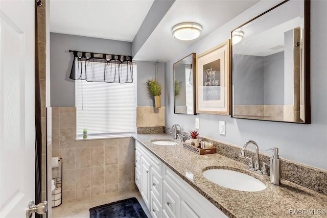 1316 Lake Ariana Blvd, Auburndale, FL 33823 - full bath with double vanity and tile patterned flooring