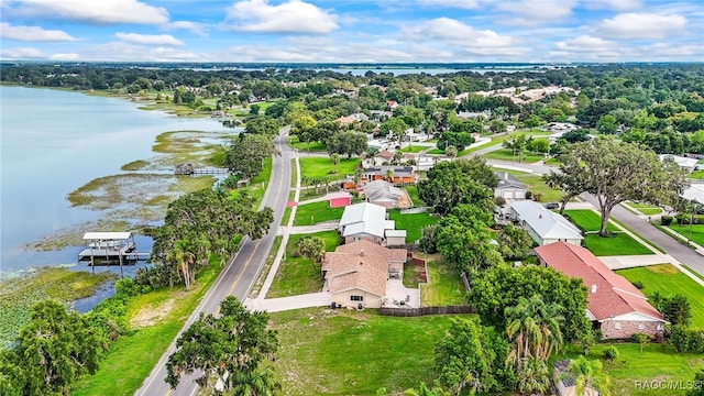 1316 Lake Ariana Blvd, Auburndale, FL 33823 - aerial perspective of suburban area with a nearby body of water