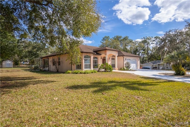 ranch-style home featuring a garage, glass enclosure, and a front lawn