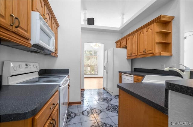 3565 S Oakdale Ter, Inverness, FL 34452 - kitchen featuring sink, white appliances, and light tile patterned floors