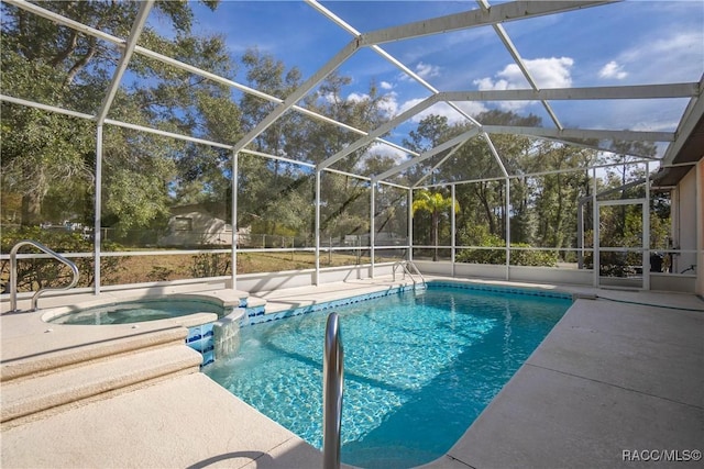 3565 S Oakdale Ter, Inverness, FL 34452 - view of pool with a lanai, a patio area, and an in ground hot tub
