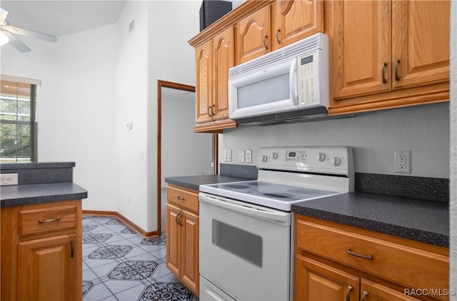 3565 S Oakdale Ter, Inverness, FL 34452 - kitchen featuring white appliances and ceiling fan
