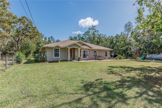 view of front of home with a front lawn