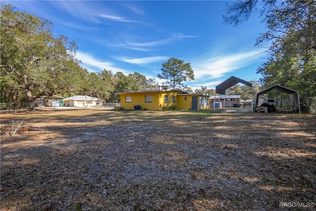 view of front of house with a carport