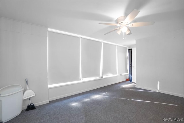 spare room with ceiling fan