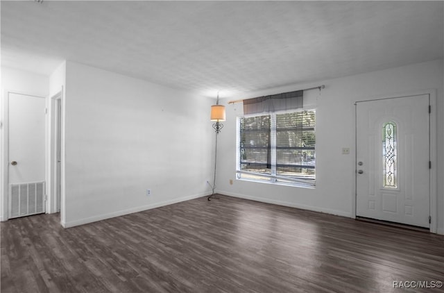 foyer featuring dark hardwood / wood-style floors