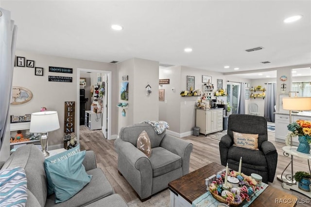 2 William Tell Ln, Beverly Hills, FL 34465 - living room featuring light wood-type flooring and recessed lighting