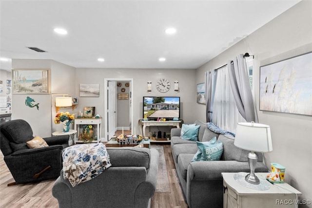 2 William Tell Ln, Beverly Hills, FL 34465 - living room featuring light wood-style floors and recessed lighting