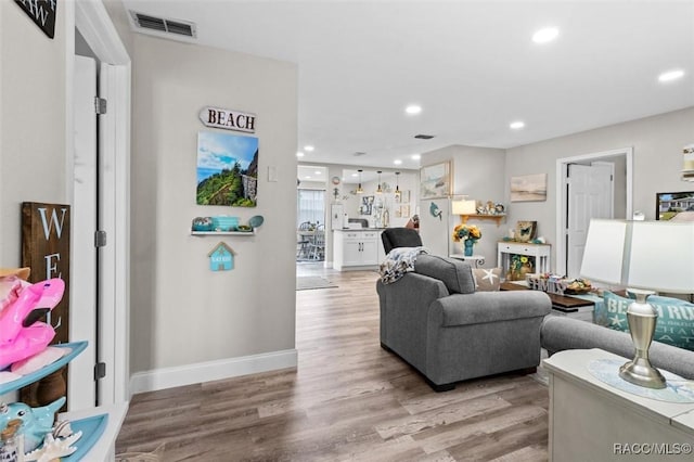 2 William Tell Ln, Beverly Hills, FL 34465 - living area featuring light wood-style flooring and recessed lighting