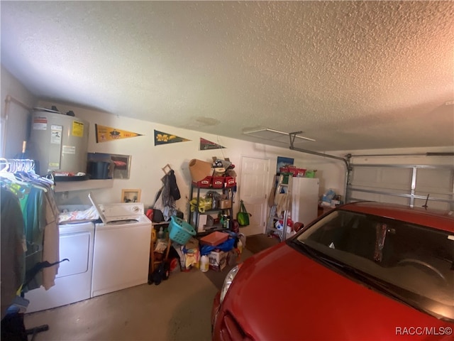 garage with independent washer and dryer and water heater