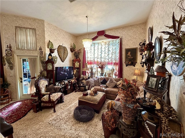 living room with a textured ceiling