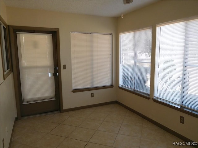 view of tiled entrance foyer