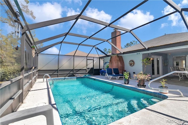 9844 SW 198th Cir, Dunnellon, FL 34432 - outdoor pool with a patio area and glass enclosure