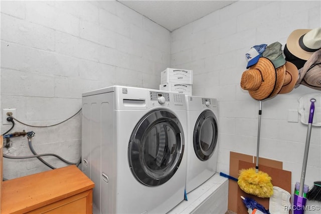 9844 SW 198th Cir, Dunnellon, FL 34432 - laundry room featuring laundry area and concrete block wall