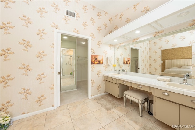 bathroom with vanity and tile patterned floors