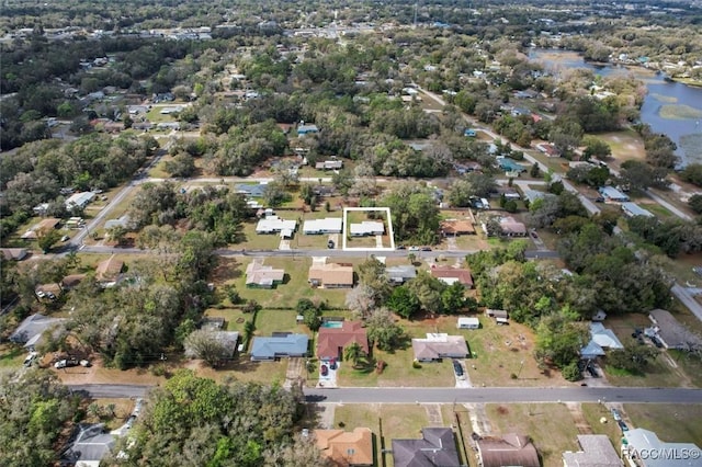 bird's eye view with a water view and a residential view