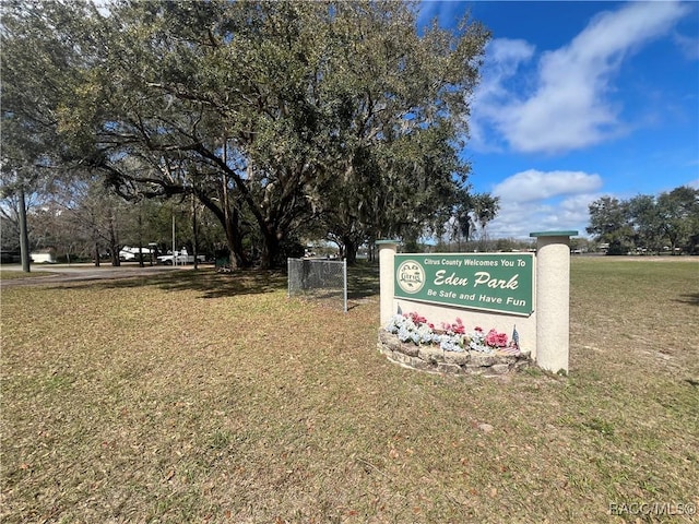 view of home's community featuring a lawn