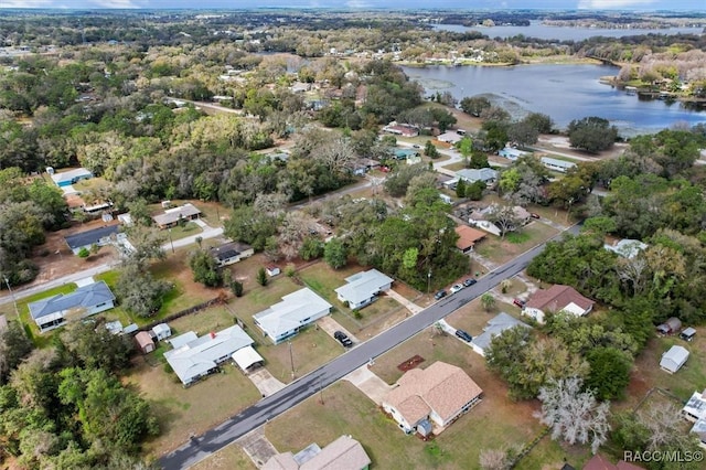 bird's eye view with a water view and a residential view