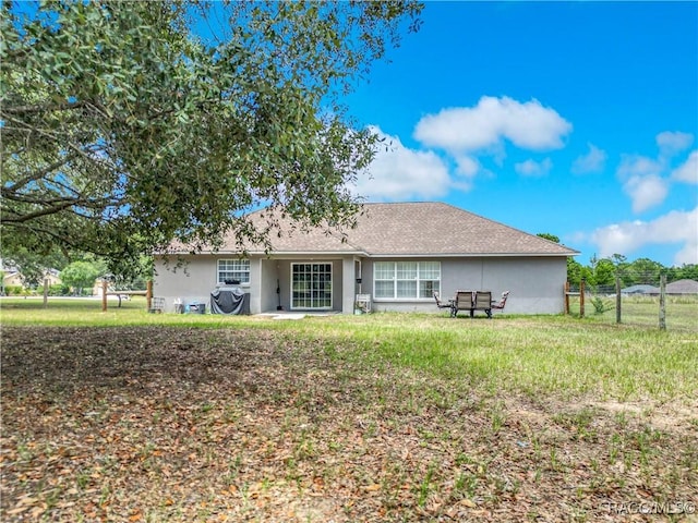 2478 W Angola Dr, Beverly Hills, FL 34465 - back of house featuring stucco siding
