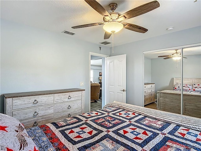 2478 W Angola Dr, Beverly Hills, FL 34465 - bedroom with ceiling fan and a closet