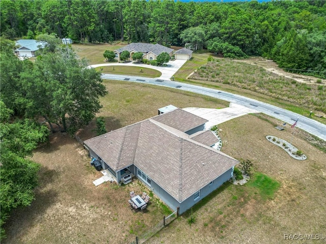 2478 W Angola Dr, Beverly Hills, FL 34465 - view of subject property with a forest