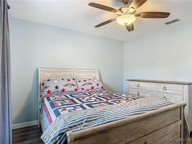2478 W Angola Dr, Beverly Hills, FL 34465 - bedroom featuring dark wood-style flooring and a ceiling fan