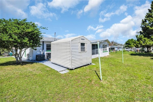 view of outbuilding with an outbuilding and central AC