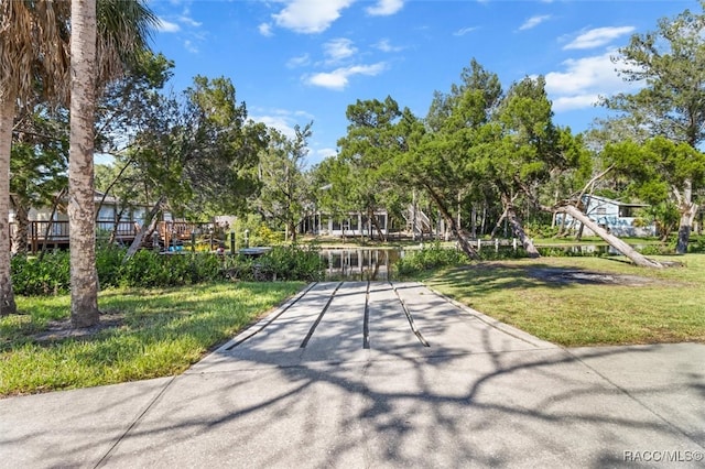 view of home's community featuring a yard