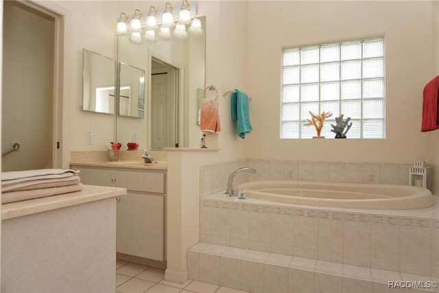 3033 N Chandler Dr, Hernando, FL 34442 - full bathroom featuring tile patterned floors, vanity, and a bath