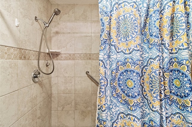 bathroom with curtained shower