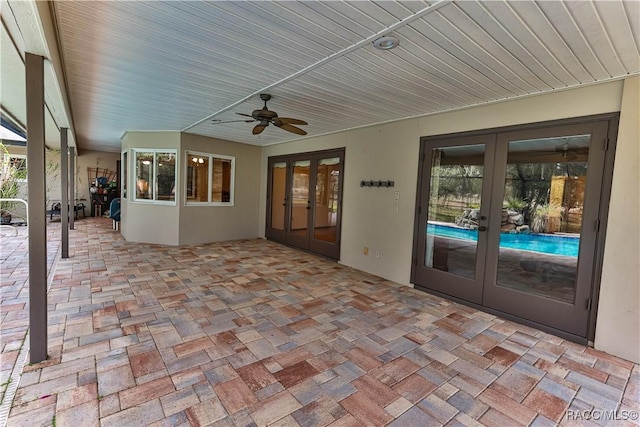 view of patio / terrace with ceiling fan and french doors