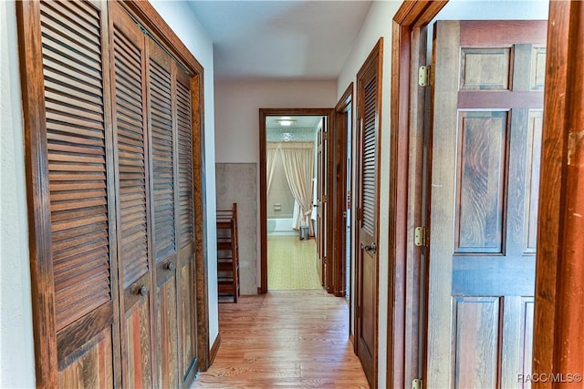 corridor featuring light wood-type flooring